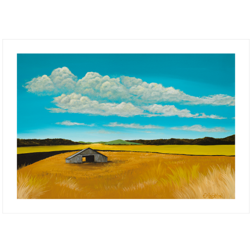 Archival print on matte paper of a contemporary rural landscape painting of a rustic barn sitting in a yellow field with green hills in the distance under a blue sky filled with purple fluffy clouds. 