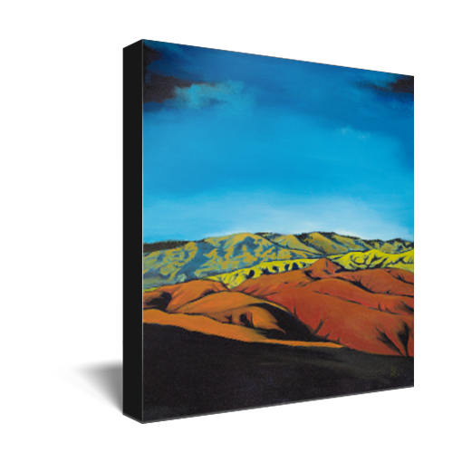 Archival print on canvas of a contemporary landscape painting of the scenic Boise, Idaho foothills in oranges and greens under a vivid blue sky. 