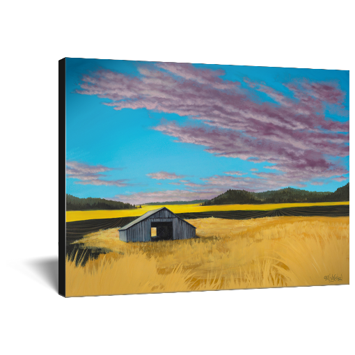 Archival print on canvas of a contemporary rural landscape painting of a rustic barn sitting in a yellow field with green hills in the distance under a blue sky filled with purple fluffy clouds. 