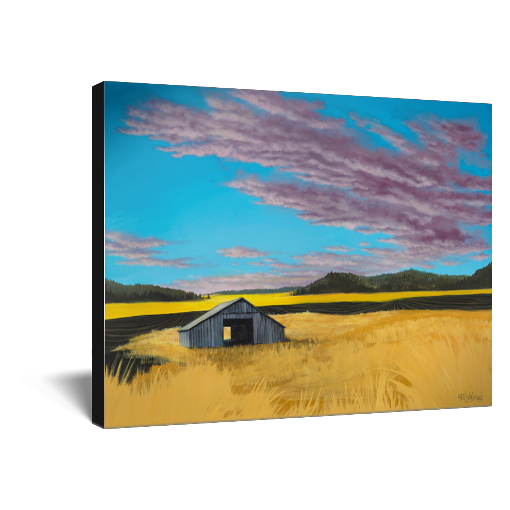 Archival print on canvas of a contemporary rural landscape painting of a rustic barn sitting in a yellow field with green hills in the distance under a blue sky filled with purple fluffy clouds. 