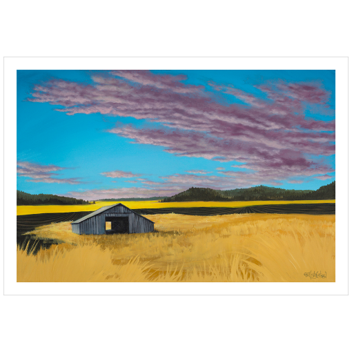 Archival print on matte paper of a contemporary rural landscape painting of a rustic barn sitting in a yellow field with green hills in the distance under a blue sky filled with purple fluffy clouds. 