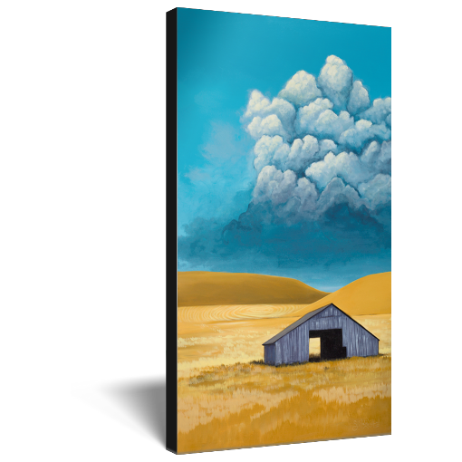 Archival print on canvas of a contemporary rural landscape painting of a rustic wooden barn sitting in a yellow field with distant hills under a blue sky with a storm rolling in. 