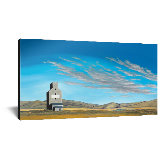 Archival print on canvas of a contemporary rural landscape painting of a grain silo sitting in a field with hills on the horizon under a big blue sky. 