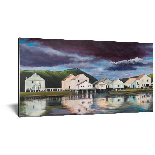 Archival print on canvas of a contemporary landscape painting of a quiet seaside town and green hills reflecting in calm waters under a stormy purple sky. 