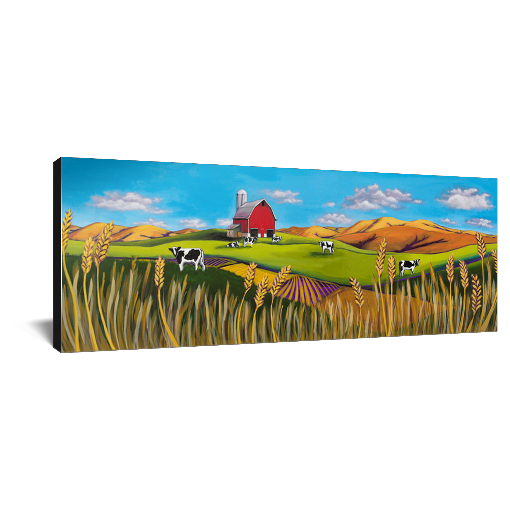 Archival print on canvas of a contemporary rural landscape painting of a red barn sitting in a green field with black and white dairy cows, wheat fields, and foothills under a bright blue sky with fluffy white clouds floating by. 